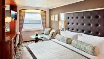 1548636025.0889_c199_Crystal Cruises Crystal Serenity Accommodation Deluxe Stateroom with Large Picture Window.jpg
